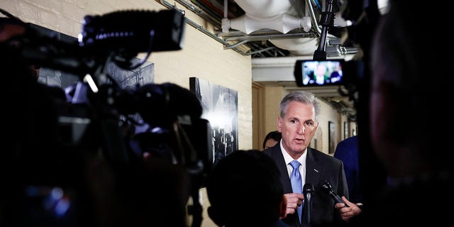 House Speaker Kevin McCarthy speaks to reporters as he arrives to a meeting at the U.S. Capitol on Jan. 11, 2023.
