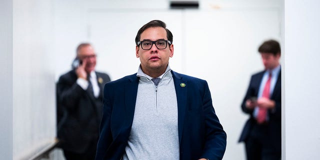 Rep. George Santos, R-N.Y., is seen outside a House Republican Conference meeting in the U.S. Capitol on Tuesday, Jan. 10, 2023. 