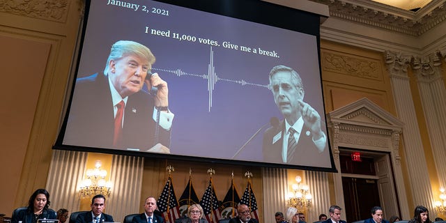 A digital presentation of President Donald Trump speaking with Georgia Secretary of State Brad Raffensperger is displayed on a screen as the House Select Committee to Investigate the January 6th Attack on the United States Capitol conducts its final hearing in the Cannon House Office Building on Monday, Dec. 19, 2022 in Washington, DC. 