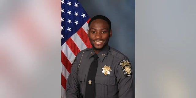 Fulton County Sheriff's Office Deputy James Thomas was found shot to death in his car in northwest Atlanta.