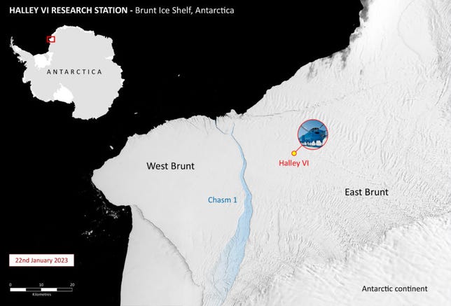 Satellite view of Brunt Ice Shelf in Antarctica shows white expanse of ice with Chasm-1 crack in light blue and location of Halley Research Station marked safely to the east of it. Iceberg is seen to the west breaking away.