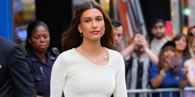 Hailey Bieber reveals she suffers from PTSD after experiencing a mini-stroke last year.