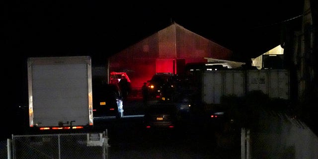 Law enforcement personnel control the scene of a shooting, Monday, Jan. 23, 2023, in Half Moon Bay, California.