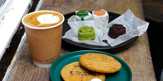 Coffee, biscuits, green tea and chocolate mooncake that contain cannabidiol, or CBD, are displayed at the Found Cafe in Hong Kong on Sept. 13, 2020.