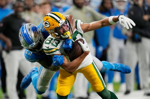 Green Bay Packers wide receiver Samori Toure is tackled by Detroit Lions safety Will Harris. The Packers lost their fourth straight game, losing to the Lions 15-9, as Aaron Rodgers threw three interceptions on the day.