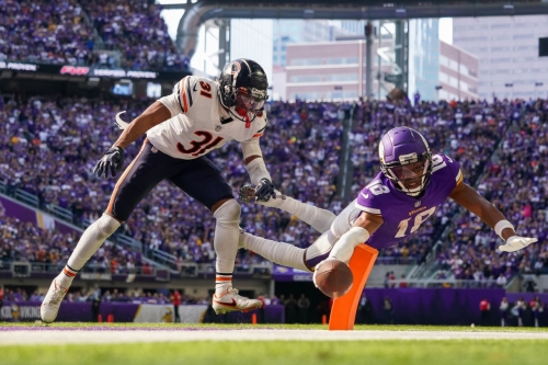 Minnesota wide receiver Justin Jefferson dives for a two-point conversion during the Vikings' 29-22 victory over the Chicago Bears.