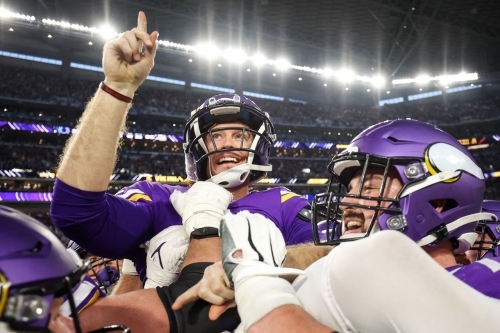 Minnesota Vikings place kicker Greg Joseph celebrates his game-winning field goal against the Indianapolis Colts. The Vikings rallied from a 33-point deficit at halftime to defeat the Colts 39-36, completing the largest comeback in NFL history.