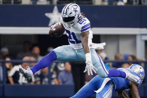 All eyes might have been focused on quarterback Dak Prescott's return but Dallas Cowboys running back Ezekiel Elliott — here hurdling Detroit Lions safety DeShon Elliott — stole the show with two rushing TDs to help America's Team to a 24-6 win over Detroit.
