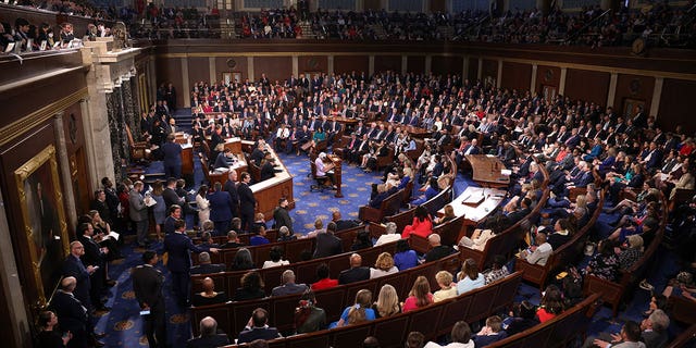 Members of the House of Representatives participate in the vote for speaker on the first day of the 118th Congress in the House Chamber of the U.S. Capitol Building Jan. 3, 2023, in Washington, D.C. 