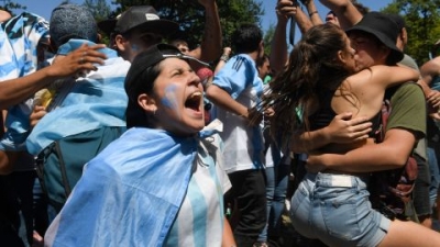 Argentine soccer fans celebrate their team's World Cup victory.
