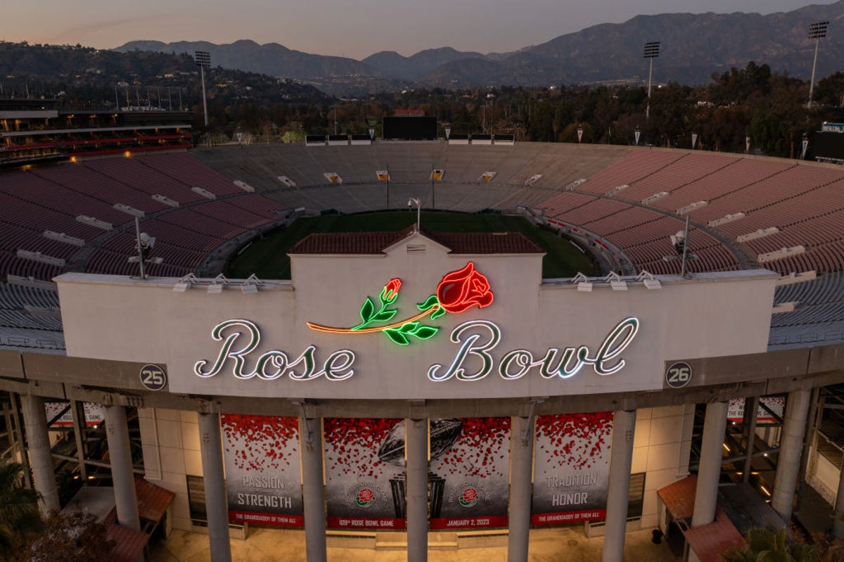 The Rose Bowl stadium with the San Gabriel Mountains in the background