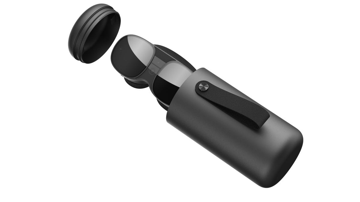 A VR headset fitting in a tube-like carrying case