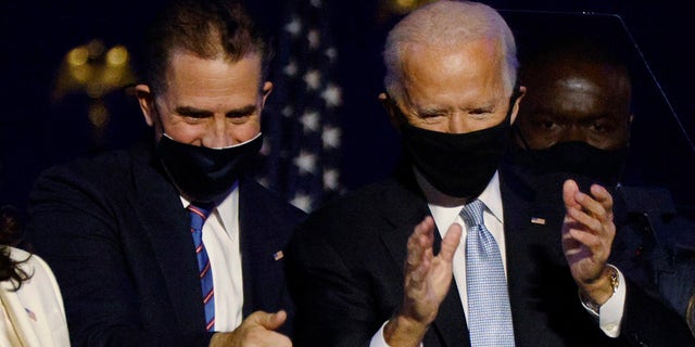 President Biden and his son Hunter Biden celebrate at an election rally in Wilmington, Delaware, after it was announced that he had won the presidential election on Nov. 7, 2020.