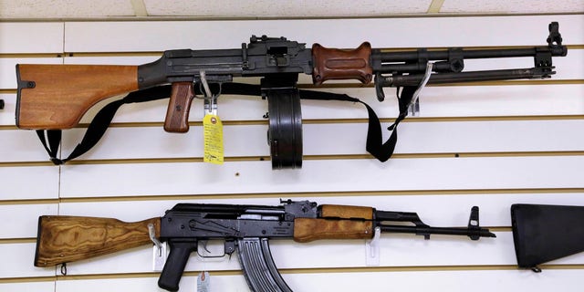 FILE - Assault weapons are seen for sale at Capitol City Arms Supply on Jan. 16, 2013, in Springfield, Illinois.