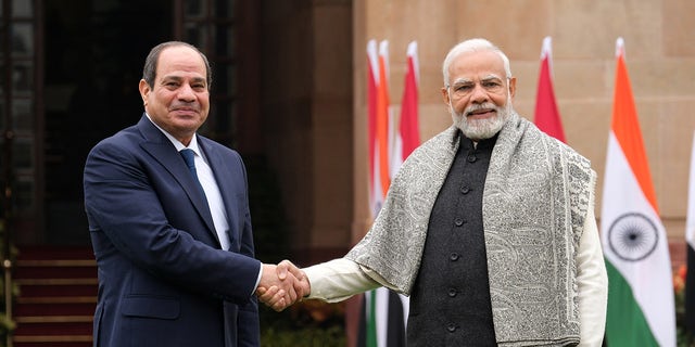 India's Prime Minister Narendra Modi, right, welcomes Egypt's President Abdel-Fattah El-Sisi as Chief Guest, in New Delhi, India, on Wednesday, Jan. 25, 2023 before India's annual Republic Day parade, Thursday. 