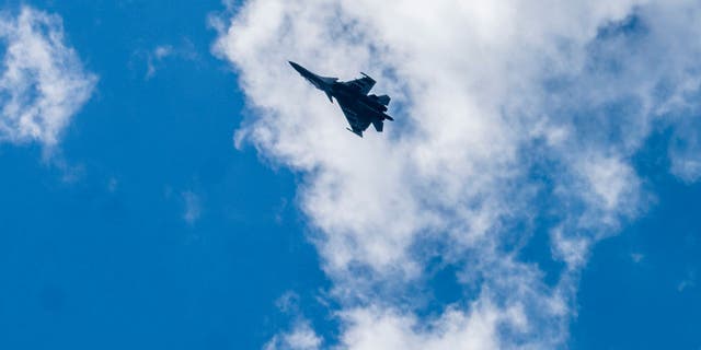 An Indian fighter plane flying in the sky toward Leh bordering China June 19, 2020, in Gagangir, India. 