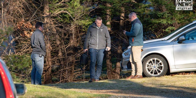 Investigators outside Walshe home at 516 Chief Justice Cushing Highway, Cohasset, MA.
