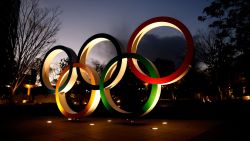 Olympic Rings are seen near the National Stadium, the main venue for the Tokyo 2020 Olympic and Paralympic Games, in Tokyo on January 8, 2021, as Tokyo Olympics organisers insisted that the coronavirus-postponed Games will still go ahead despite Japan declaring a state of emergency less than 200 days before the opening ceremony. (Photo by Behrouz MEHRI / AFP) (Photo by BEHROUZ MEHRI/AFP via Getty Images)