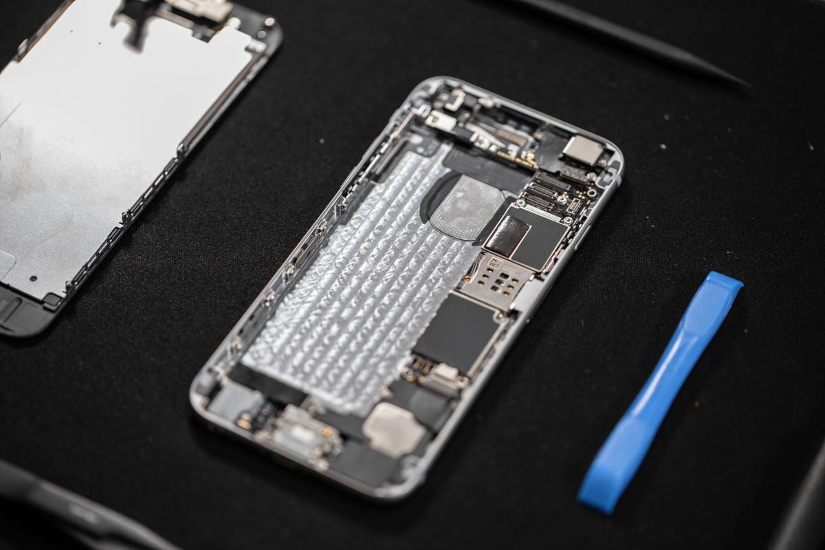 An iPhone battery being replaced
