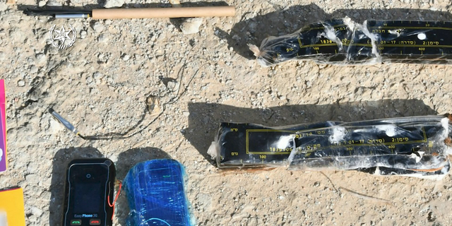 Cellphones and explosives recovered by Tel Aviv police as part of their covert operation.