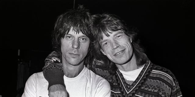 Jeff Beck with Mick Jagger in 1986. 