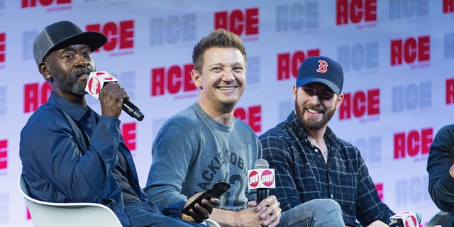 Don Cheadle, Jeremy Renner and Chris Evans speak on stage during ACE Comic Con.