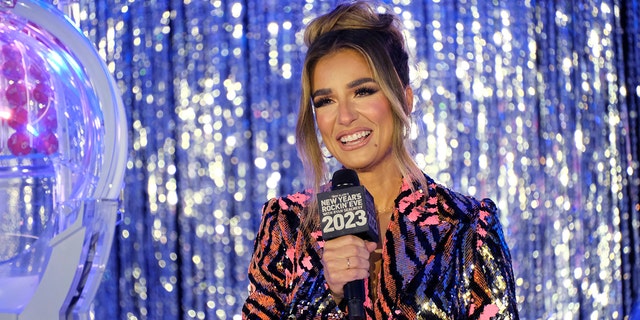 Jessie James Decker was forced to defend her parenting after she was accused of photoshopping abdominal muscles onto pictures of her kids.