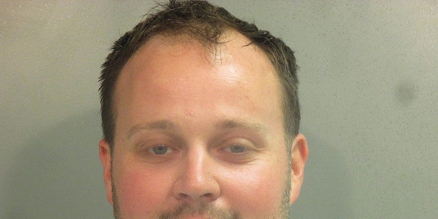 Former "19 Kids And Counting" television personality Josh Duggar poses for a booking photo after his arrest April 29, 2021, in Fayetteville, Arkansas.