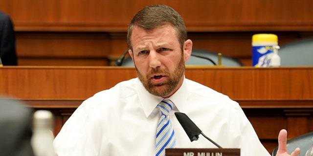 The move has been met with conservative backlash, with newly-minted Oklahoma Senator Markwayne Mullin, a Republican, telling reporters on Tuesday he and his family were skipping the ceremony and group photo with Harris.