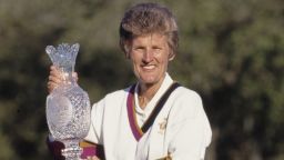 Kathy Whitworth, Team Captain for the United States holds the trophy aloft after Team USA defeated Europe in the inaugural Solheim Cup competition golf tournament on 18th November 1990 at the Lake Nona Golf & Country Club in Orlando, Florida, United States.