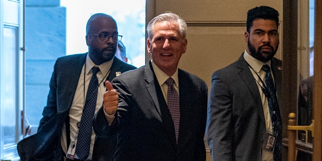 House Minority Leader Kevin McCarthy, R-Calif., center, arrives at the Capitol as the House met for a second day to elect a speaker and convene the 118th Congress on Capitol Hill in Washington, Wednesday, Jan. 4, 2023.