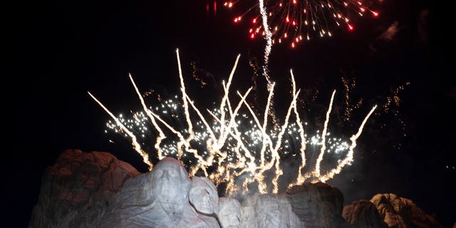 Fireworks light the sky at Mount Rushmore National Memorial, Friday, July 3, 2020, near Keystone, S.D., after President Donald Trump spoke. 