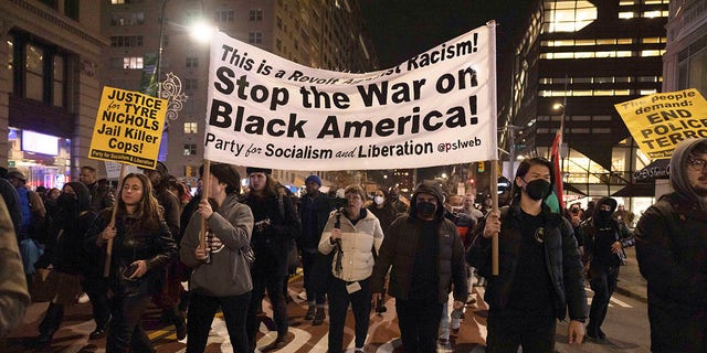 Demonstrators march during a protest Saturday, Jan. 28, 2023, in New York, in response to the death of Tyre Nichols, who died after being beaten by Memphis police during a traffic stop.  