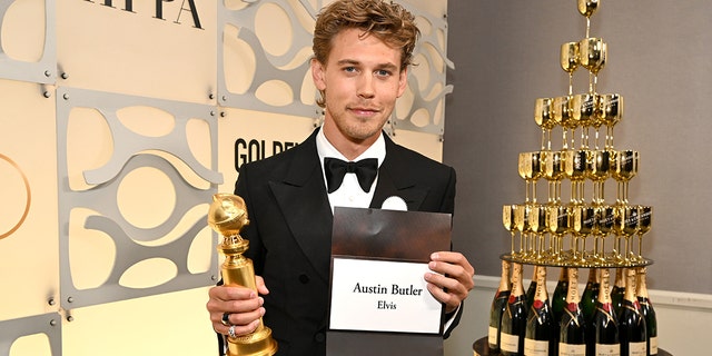 Austin Butler poses with the Best Actor in a Motion Picture – Drama award for "Elvis" at the 80th Annual Golden Globe Awards with Moët And Chandon at The Beverly Hilton on Jan. 10, 2023 in Beverly Hills, California. 