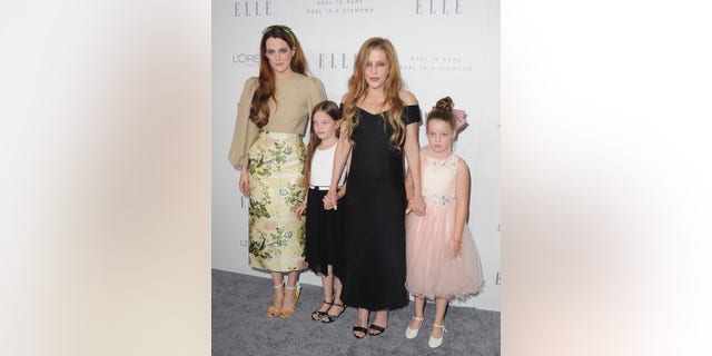 Riley Keough and Lisa Marie Presley attend event in Los Angeles with twins Harper and Finley. 