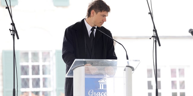 Ben Smith-Petersen read a tribute by Riley Keough, Lisa Marie Presley's daughter, at the public memorial for Lisa Marie Presley on Jan. 22, 2023, in Memphis, Tennessee.