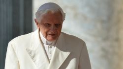 Pope Benedict XVI walks to the altar as he arrives on St Peter's square for his last weekly audience on February 27, 2013 at the Vatican.