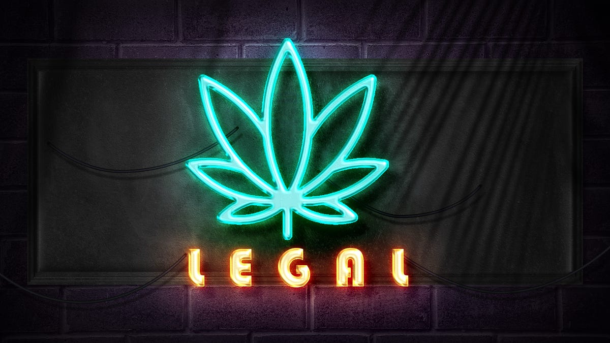 neon sign with marijuana leaf