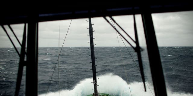 Waves break on the Greenpeace ship Arctic Sunrise in the Drake Passage as it navigates toward the Antarctic Peninsula on Feb. 10, 2018.