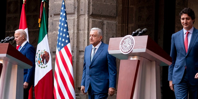 President Joe Biden, Mexican President Andres Manuel Lopez Obrador, and Canadian Prime Minister Justin Trudeau arrive for a news conference at the 10th North American Leaders' Summit at the National Palace in Mexico City, Tuesday, Jan. 10, 2023. 