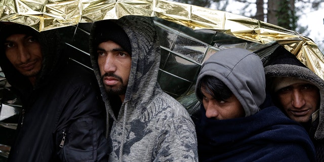 Migrants wait for food distribution in Bihac, Bosnia, close to the border to Croatia on Nov. 28, 2018. The number of attempts by migrants to enter the European Union without authorization reached around 330,000 last year, the highest number since 2016, the EU’s border and coast guard agency said Friday, Jan. 13, 2023.