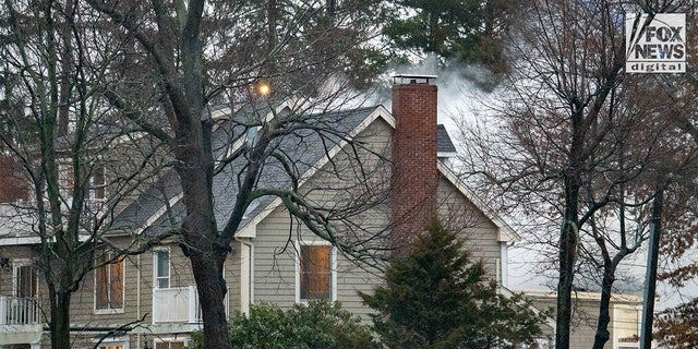 Firefighters battle a blaze at 725 Jerusalem Road in Cohasset, MA on Friday, January 7, 2023. The home once belonged to Ana Walshe who has been reported missing, last seen on New Year's Day.