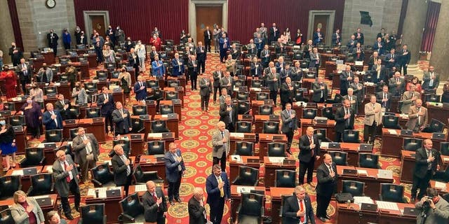Members of the Missouri House of Representatives recite the Pledge of Allegiance as they begin their annual legislative session Wednesday, Jan. 5, 2022, in Jefferson City, Missouri.