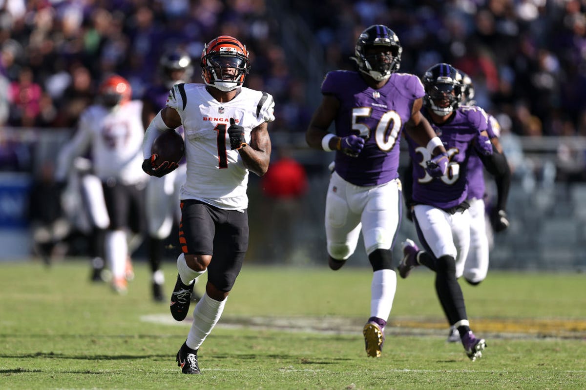 Ja'Marr Chase runs away from the Baltimore Ravens