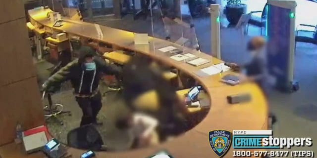 Video released by the NYPD shows a man stabbing two MoMa employees repeatedly.