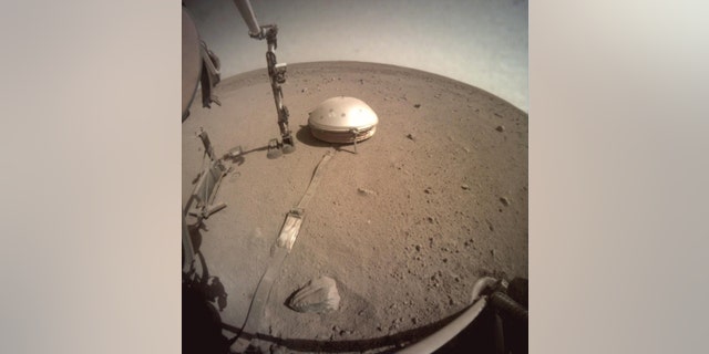 The domed seismometer on NASA’s InSight Lander measured Mars’s largest quake.