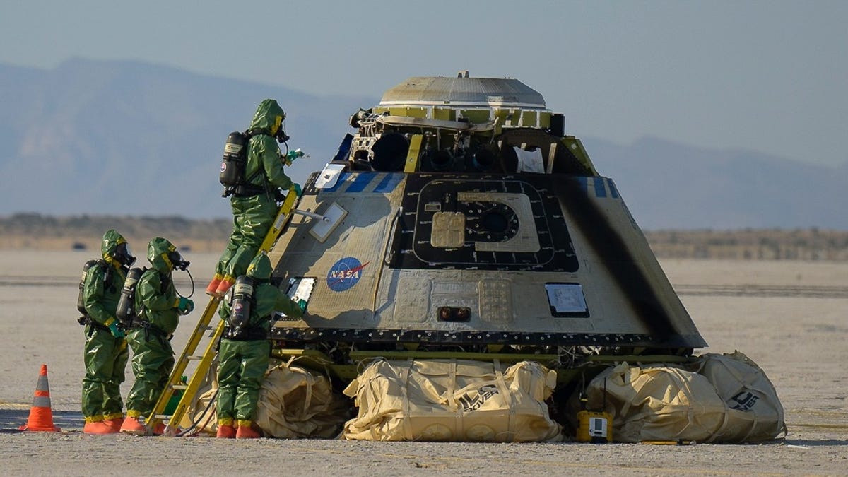 Boeing's Starliner spacecraft after touchdown in the desert