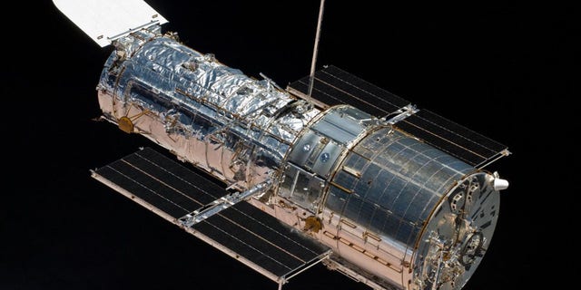 An astronaut aboard the space shuttle Atlantis captured this image of the Hubble Space Telescope on May 19, 2009.