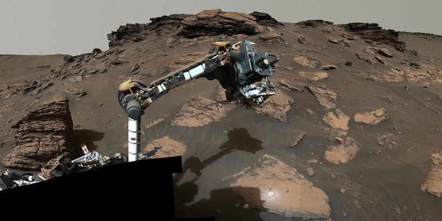 NASA’s Perseverance rover puts its robotic arm at ‘Skinner Ridge’ in Mars’ Jezero Crater. 