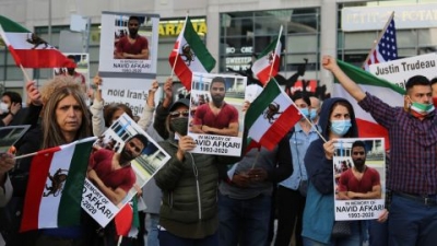 Iranians in Canada on Mel Lastman Square demonstrate against the execution of wrestler Navid Afkari by the Iranian regime, in Toronto, Ontario in September 2020. The death sentence caused international uproar, yet the regime persisted.  